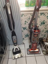 Two of several floor cleaners