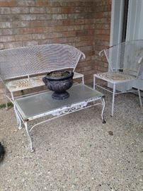 White settee, chair, and table