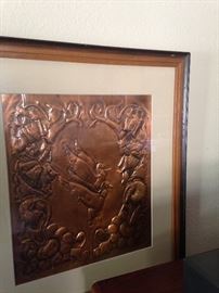 One of two embossed framed copper art