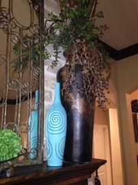 Another fine vase with arrangement goes great with high ceilings. The turquoise vase lends a fabulous pop of color. (Mirror - not for sale.)