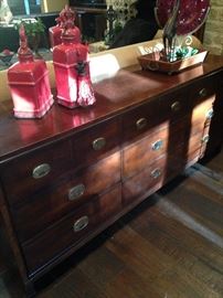 This dresser has a matching armoire, bed, and nightstands.