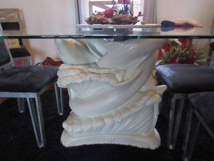 with Dolphin pedestal base, an unusual piece for the discerning taste