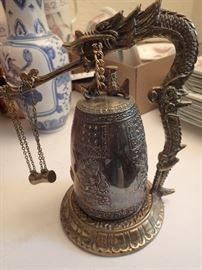 DRAGON HOLDING A BELL WITH A SWINGING DONG