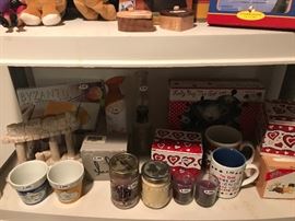 Various Candles And Mugs