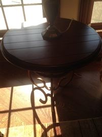 Round side table with wood top and metal base - 27 1/2 round and 26 H.   $195 - original price $435