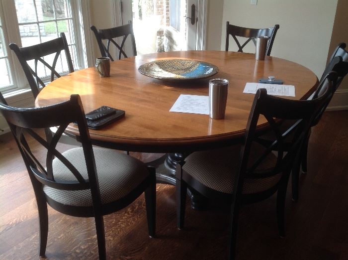 Nichols and Stone dining room table with 6 chairs....measures 77 L with leaf and 60w.   $1000