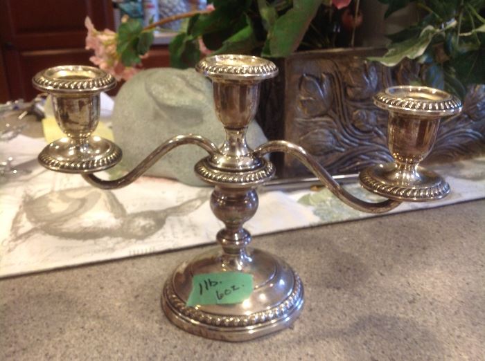 Silver  candlesticks. Weighed in ounces.  They are cement weighted.