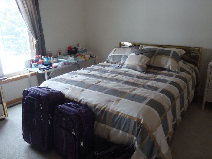 Queen Bed, luggage, personal products