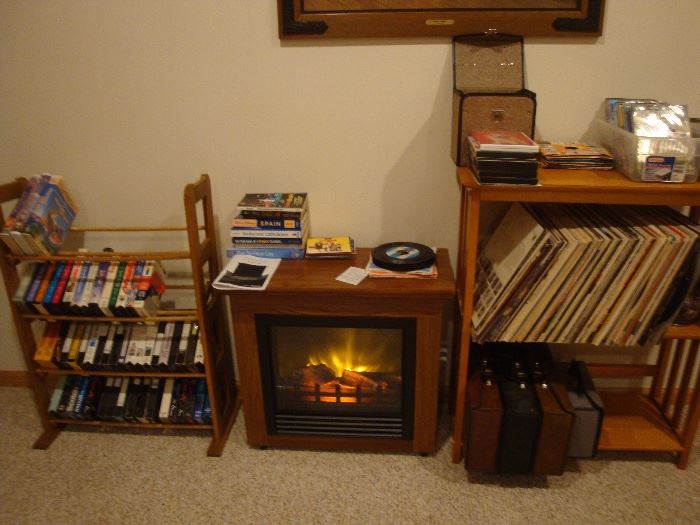 vhs tapes, cassette tapes, dvd's, Decoflame Electronic portable fire place heater M100-25FAO, bookcase