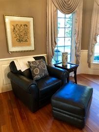 Leather arm chair with ottoman - Botanical in background