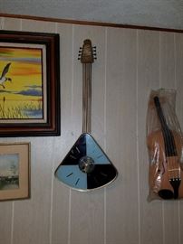 We be lovin' this musical instrument clock