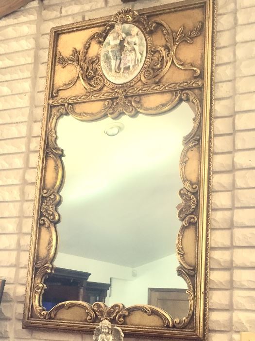 Incredible mirror with inset bisque porcelain medallion 