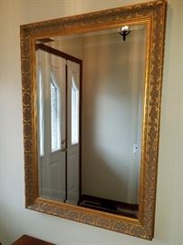 Large wall mirror with beveled glass, solid wood beautifully carved frame.  29" x 41".