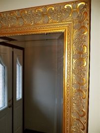 Large wall mirror with beveled glass, solid wood beautifully carved frame.  29" x 41".