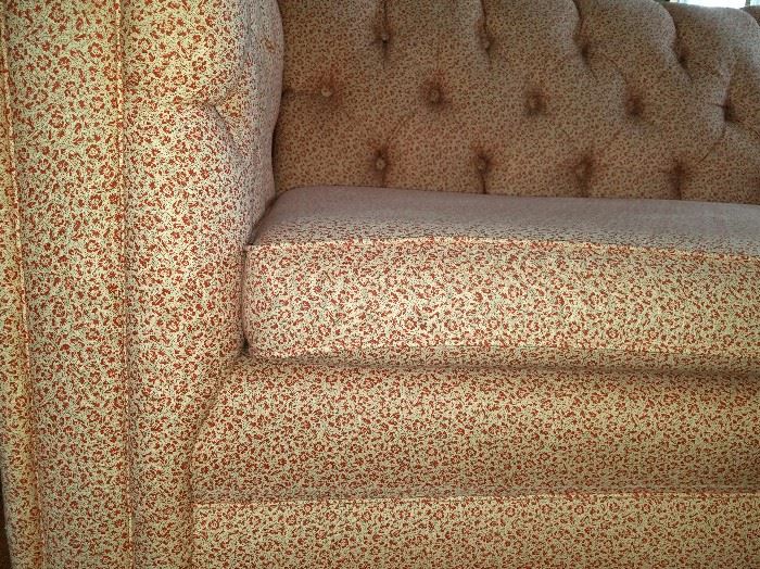 Extra long vintage sofa by Homer Brothers, Chicago.  Fully tufted back and arms.  Has been recovered in tiny floral pattern Laura Ashley print.  96" wide x 36" deep.