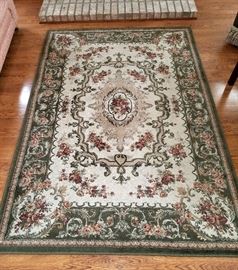 rea rug, 5'3" x 7'6", manmade fiber (cream olive green, rose).  Excellent condition.