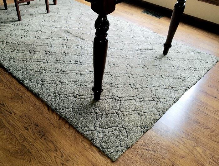 5' x 8' rug, grayish tan, by Harmony Contemporary.
