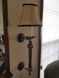 Brass wall lamp with 3-way light.  26"long.