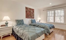 Twin mcm beds with mcm nightstands.