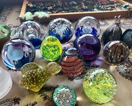 Lots of art glass paperweights, some signed.