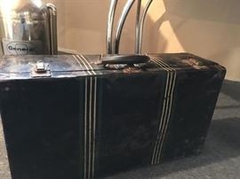 Vintage suitcases are in (not sure why!) but here is a neat old metal suitcase.