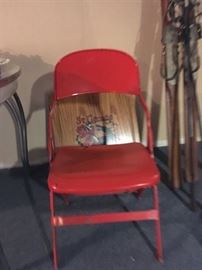 What is significant about this red metal folding chair?  It is a remnant/artifact from Joe Louis Arena!