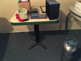 One of two neat old bar tables.