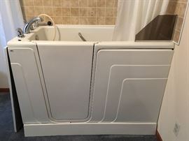 This walk-in tub is in excellent condition -- a Zon made by the Clark Company.  The receipts show the original purchase price at -- ready?! -- $12, 495.00!  A real bargain.