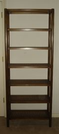One of a pair of vintage shelves with wood and caning