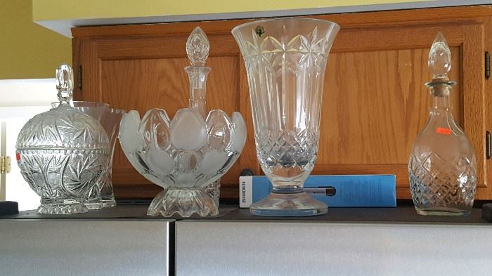 Waterford crystal vase, crystal decanters, bowls and other vases.
