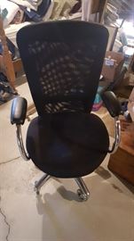 Desk chair with vented back.