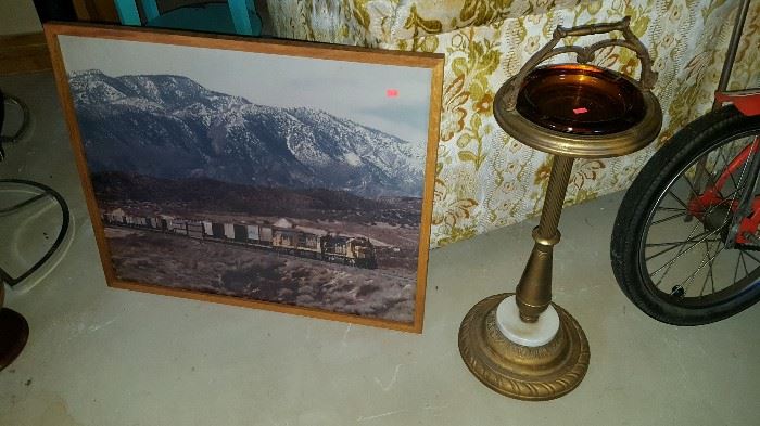 Large railroad picture and vintage ashtray stand with marble and gold base.