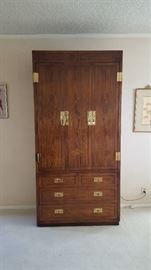 Campaign Armoire by Henredon 
Regal and sophisticated
DETAILS
Dimensions 60ʺW × 18ʺD × 80ʺH
Condition Excellent
Styles Campaign
Brand Henredon