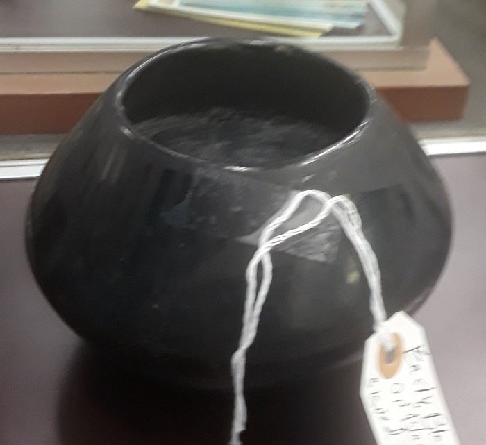 Early black on black pottery signed