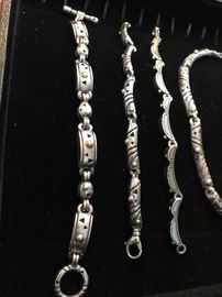Designer John Atencio sterling silver & 18 karat gold jewelry