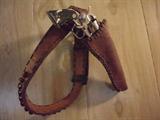 HAND TOOLED LEATHER HOLSTER AND BELT WITH A VINTAGE 38 CAP PISTOL
