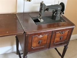 Kenmore sewing machine in cabinet