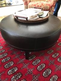 Leather ottoman/rug not available