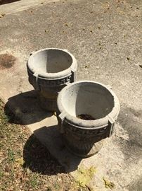 Cement urns with grape motif