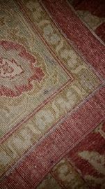 back of antique floral rug