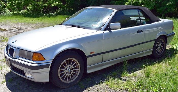 1997 BMW 318i Convertible Coupe | Silver Exterior, Black Soft Top, and Black Interior; 159,295 Miles; Automatic Transmission; Power Windows, Locks, Mirrors; Power Convertible Top; Remote Keyless Entry; Heated Seats; Pioneer Stereo with CD/MP3; AAC & USB Ports, and more!  VIN: WBABH8322VEY12212