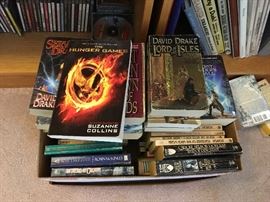 Many Sci Fi and Fantasy books, Hobbit, etc...