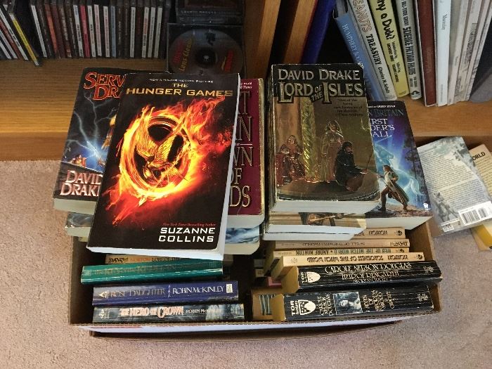 Many Sci Fi and Fantasy books, Hobbit, etc...