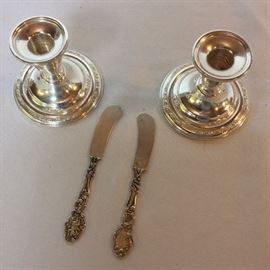 Sterling Silver Candlesticks and Butter Knives. 