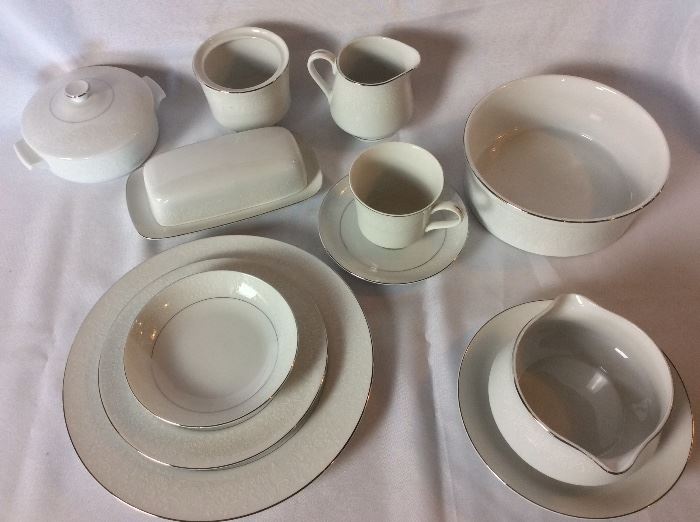Crown Victoria Lovelace Pattern. Japan. 20 Dinner Plates, 20 Berry Bowls, 8 Salad Plates, 8 Saucers, 6 Cups, 5 Soup Crocks, Serving Bowl, Cream and Sugar, Gravy Boat, Butter Dish. 