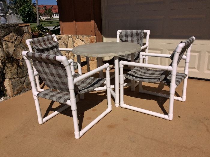 PVC Patio Dinette  Set. 4 Sling Chairs. 36” Round Dining Table. 
