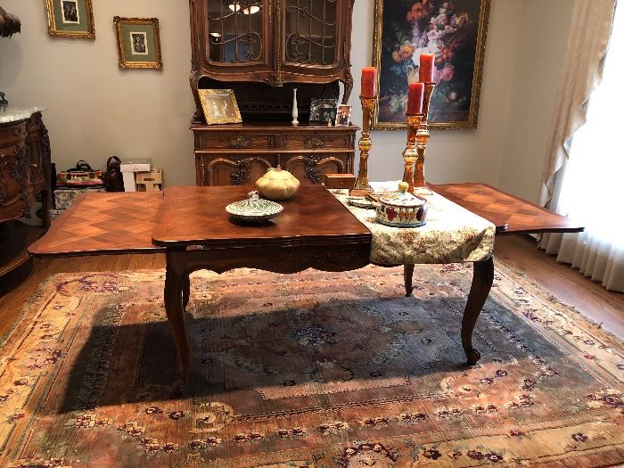dining room table that is small enough and  pulls out on the sides for  a large table.  This can also be used as a kitchen table