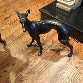 two  bronze dogs