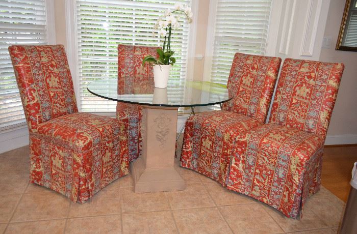 glass top table w/4 upholstered chairs