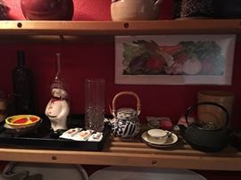 Lots of pots and pans and cooking items 